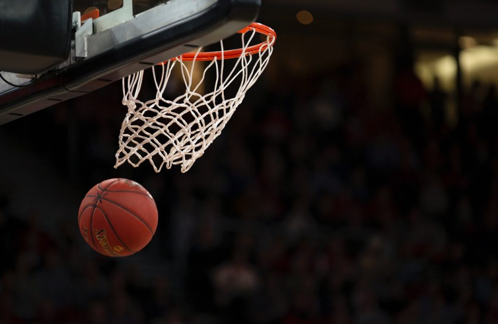 basketball flying into hoop